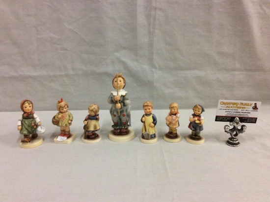 Collection of 7 TMK 7 figurines includes "parade of lights" see pics