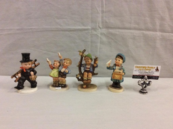 Collection of 4 TMK4 Hummel figurines including "Postman" see pics