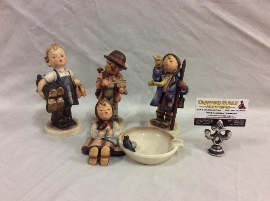 Collection of 4 TMK2 Hummel figurines includes violin boy + trumpet boy