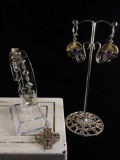 Sterling silver bracelet, pendant, and earrings