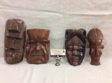 Collection of 4 masks, including an Ironwood from Indonesia and 1 from Philippines