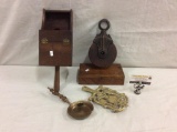 Selection of antique primitves including antique ballot box, pulley, trivet and more