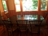 custom made granite top dining room table with wrought iron base, chairs not included