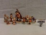 Nice collection of 9 Hummel figurines, 5 TMK4, 3 TMK5 & 1 TMK6