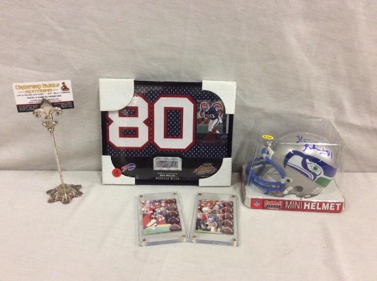 Set of sport memorabilia incl. Eric Moulds auto'd plaque, Seahawks mini helmet, and more! see desc