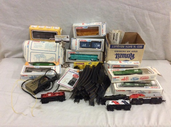Large collection of Lionel HO scale trains in boxes + tracks, switches and bumpers - see pics