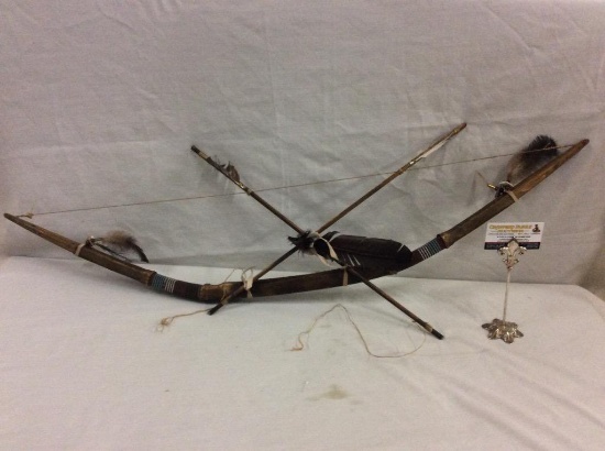 Handmade Native American style bow and arrow set w/ hand stitched leather , feathers, and bead work