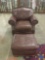 Modern studded faux leather brown armchair and ottoman