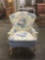 Vintage floral upholstered wing-back chair