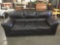 Large dark brown leather couch as is
