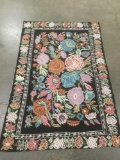 Vintage hand made Indian area rug w/ bright floral pattern on black background