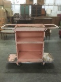 Vintage industrial metal pink rolling cart