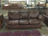 Modern studded faux leather brown couch