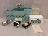 Collection of 4 diecast Hallmark Kiddie Car Classics incl 1929 Steelcraft by Murray Roadster