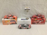 3 nascar diecast 1:24 scale cars; 2 from action racing # 19 dodge & # 20 tony stewart