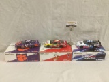 3 TeamCaliber 1:24 scale die cast nascar cars; includes 2000 exide ford taurus