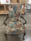 Vintage book-themed upholstered library chair w/mahogany wood frame and studded detail