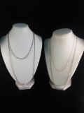 Collection of 4 elegant sterling silver necklaces