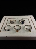 Collection of 5 sterling silver rings, 4 @ size 7 and 1 @ size 5