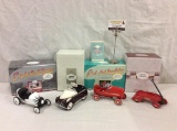 Set of 4 diecast Hallmark Kiddie Car Classics; includes 1960 eight ball racer & 39 Lincoln Zephyr