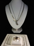 2 sterling silver necklaces, one chain with gold plated finish, and a sterling silver ring