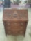 Antique heavily carved secretary desk w/ brass rail detail top and intricate design - as is see desc