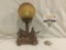 Art deco bronzed Harlequin theme 30's table lamp with textured globe glass shade