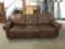 Vintage dark chestnut faux leather hide-a-bed