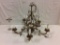 Lovely brass chandelier with figural leaf detail and porcelain flower embellishments