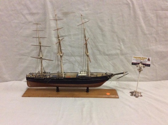 vintage wooden sailing vessel model on stand