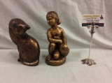 Set of vintage Victorian figurines incl. composite cat and a resin child holding a duck in gold