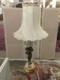 Vintage brass and crystal cherub lamp with dangling crystal detail and flared shade - good cond