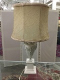 Vintage porcelain flower motif lamp with textured shade and vase/pedestal base