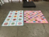 Set of 2 vintage handmade quilts with ornate colorful designs