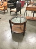 Modern wooden two tiered glass top end table as is