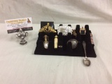 Selection of collectibles and jewelry pieces incl rings, necklace, sterling spoon & more see pics