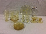 Selection of 26 yellow depression glass items incl glasses, candleholders and a compote