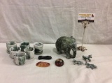 Selection of stone and alabaster items incl. animals, elephant figure and 6 cup set