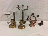 Selection of 7 vintage candle holders including 2 copper, brass and 1 hand wrought candle holder