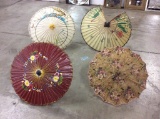 Collection of 4 antique umbrellas with beautiful designs including one made in Indonesia