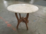 Gorgeous spoon carved wood base table with round marble top