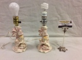 Pair of antique art deco porcelain cherub and ribbon base table lamps