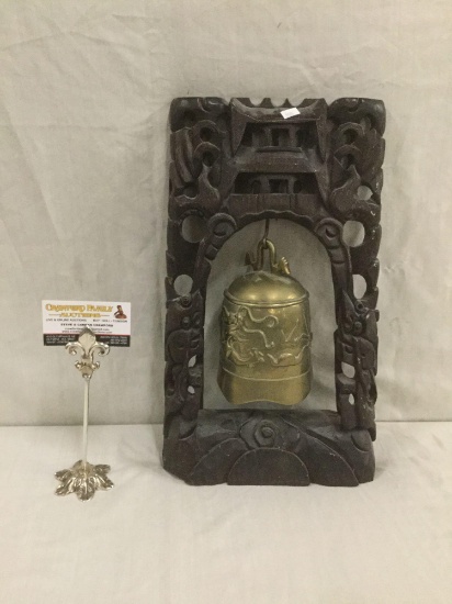 Vintage heavily carved wooden altar holding an Asian brass bell w/ dragon design