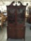 Vintage mahogany Winthrop style curio cabinet/server w/ crested top and in nice cond