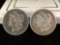 2 silver Morgan dollars, 1883 and a 1886-O