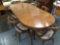 Vintage Borghese flame top table w/ 6 upholstered chairs, & 2 leaves