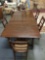 Vintage dining table and 6 chairs w/ eastlake style spoon carved detail & cane seats