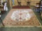 Karastan wool 8 x 11 area rug - Nomadic Naturals pattern in neutral and orange tones