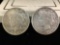2 silver peace dollars, 1922-D and a 1923-D