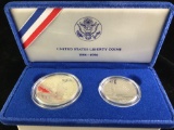 1986 United States liberty proof silver dollar and clad half dollar